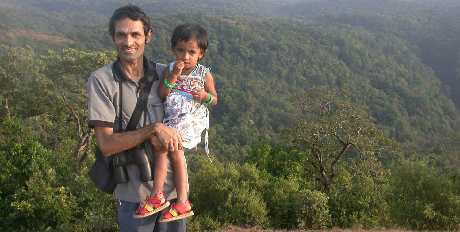 CEPF grantee Balu Hegde and his daughter in front of the Aghanashini Valley, which he successfully protected as a community co-managed conservation reserve, with support from a CEPF small grant.