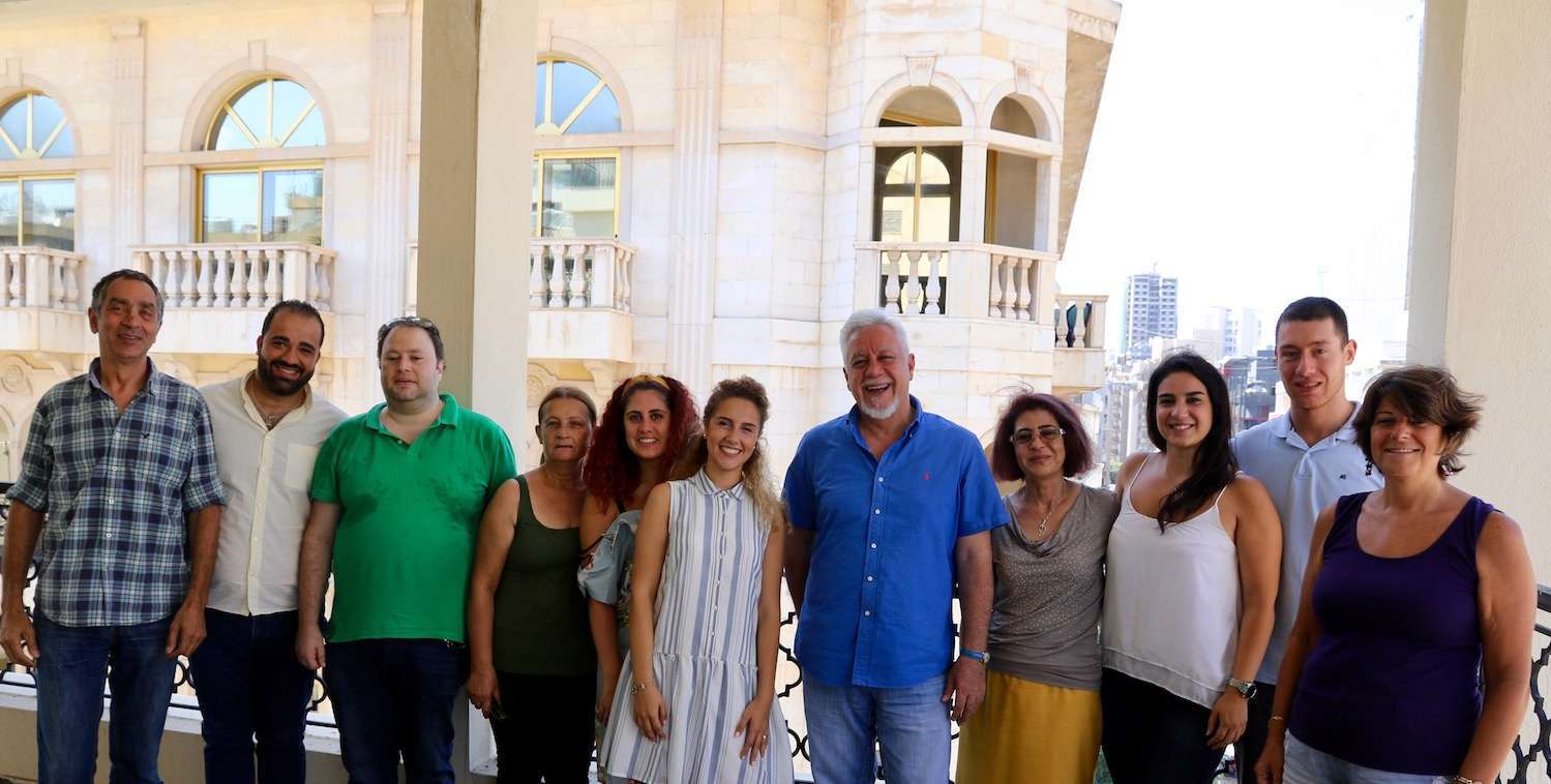 Midori Prize winner Assad Serhal stands in the center of his team of women and men from the Society for the Protection of Nature in Lebanon.